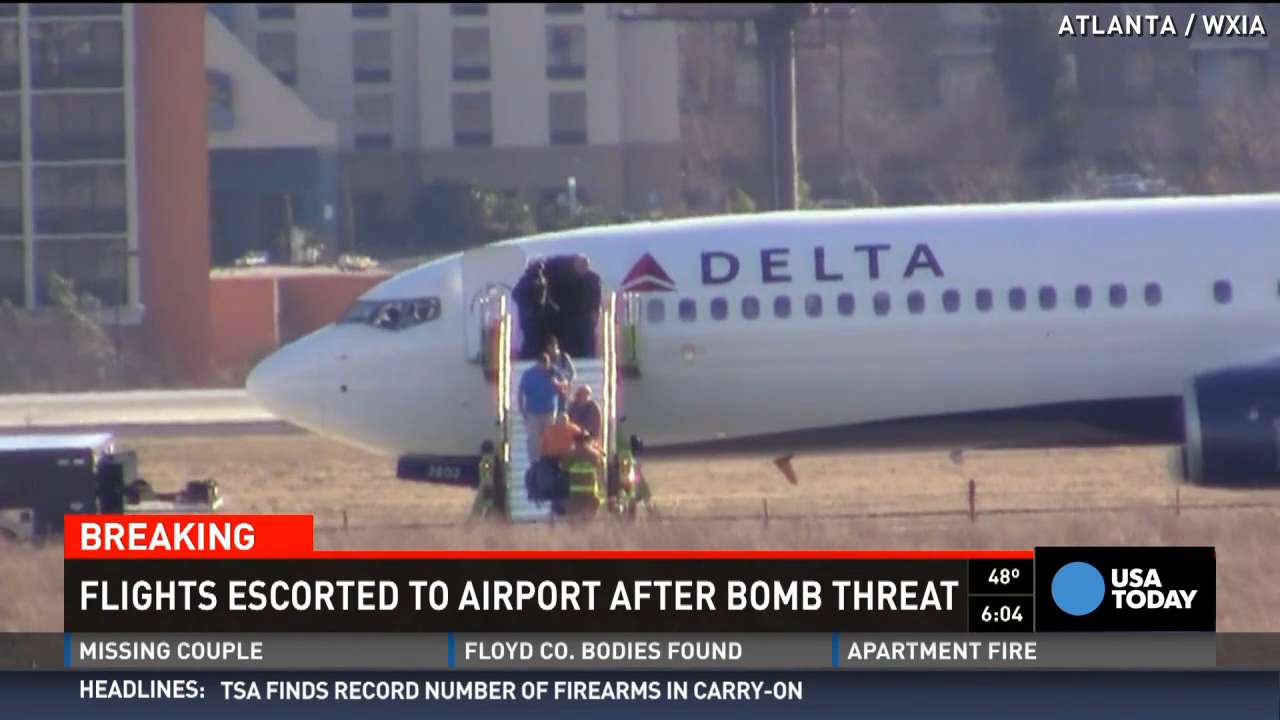 Planes escorted to Atlanta airport after bomb threat
