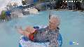 He's almost 100, but still going down waterslides