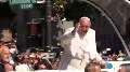 Pope Francis charms D.C. parade crowd
