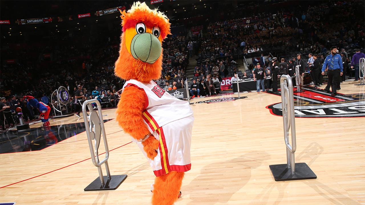 Watch: Heat mascot botches jump, lands on other mascots, celebrates