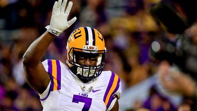 Leonard Fournette LSU Tigers Unsigned Purple Jersey Celebrating After  Touchdown Photograph