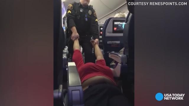 Video Woman Dragged Off Delta Flight From Detroit