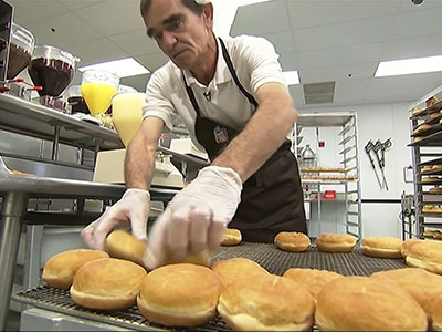 Doughnut finisher adds final touch to tasty treats