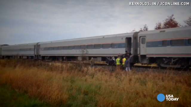 Amtrak train splits semi truck in collision