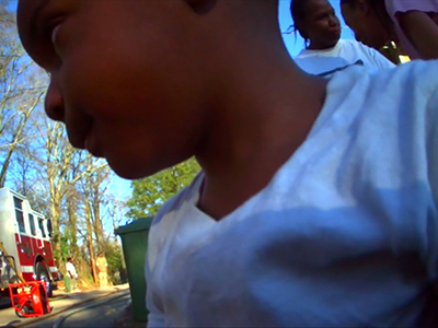 Body cam shows rescue of child from burning home